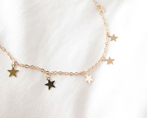 COLLAR ESTRELLAS ENCHAPADO EN ORO
