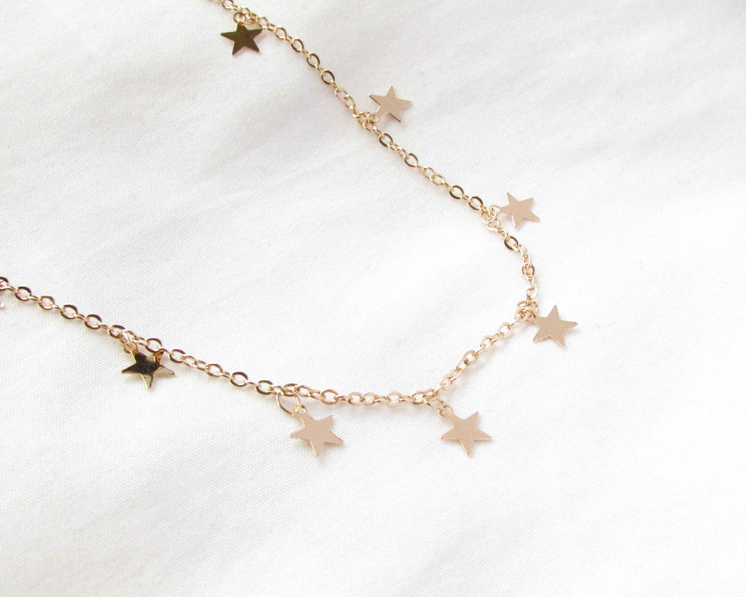 COLLAR ESTRELLAS ENCHAPADO EN ORO