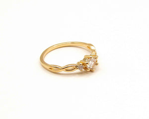 ANILLO TRES CIRCONES ENCHAPADO EN ORO