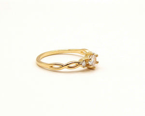 ANILLO TRES CIRCONES ENCHAPADO EN ORO